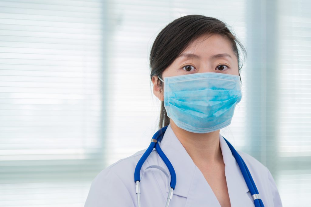 Young asian doctor with medical masks
